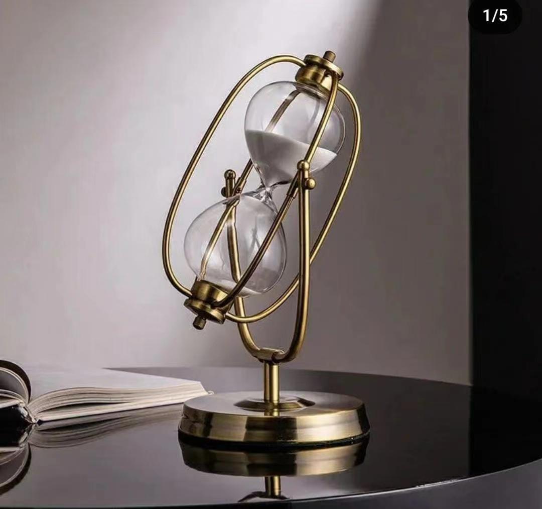 Rotating metal sand hourglass